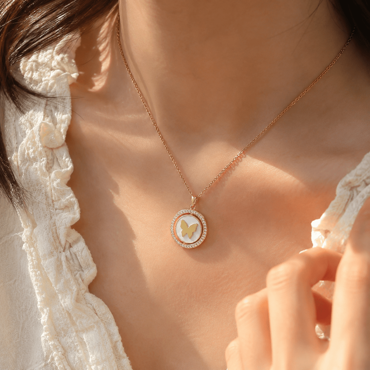 Woman wearing Butterfly Charm Gold-Plated Pendant - CharmsCrafted