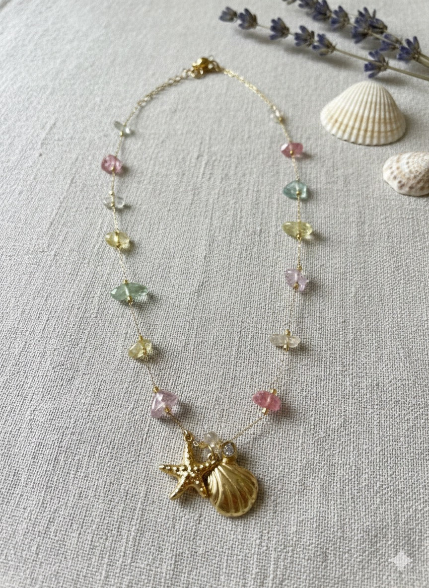 Flat lay of Coral charm necklace - CharmsCrafted