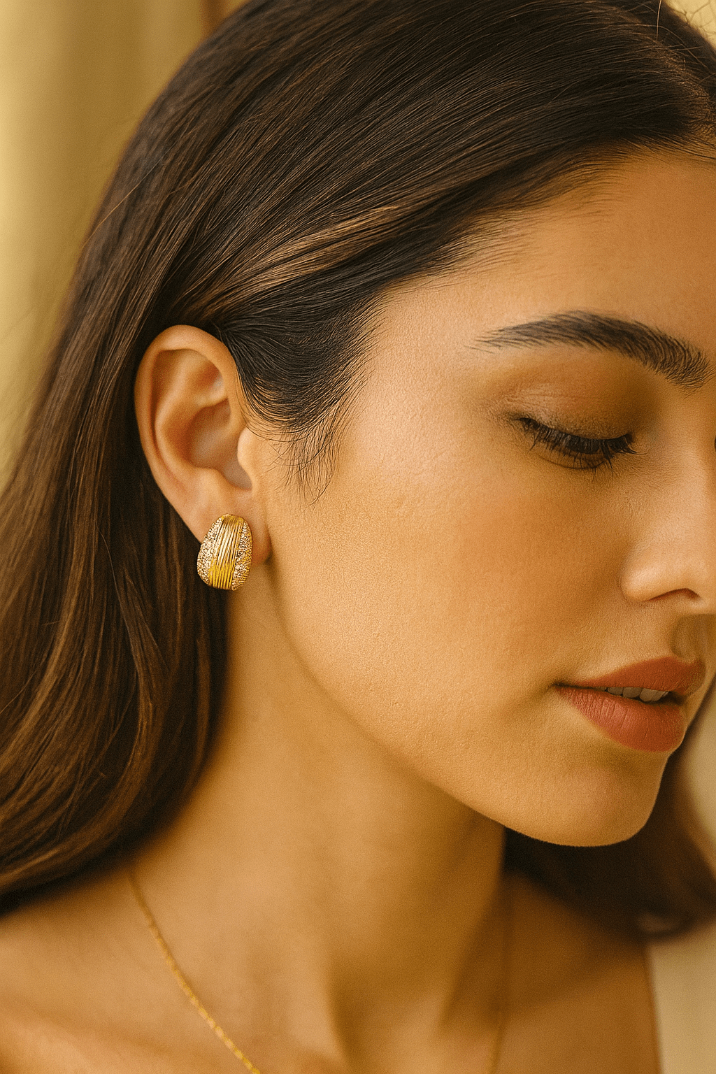 Woman wearing Eternity Gold Plated studs - CharmsCrafted