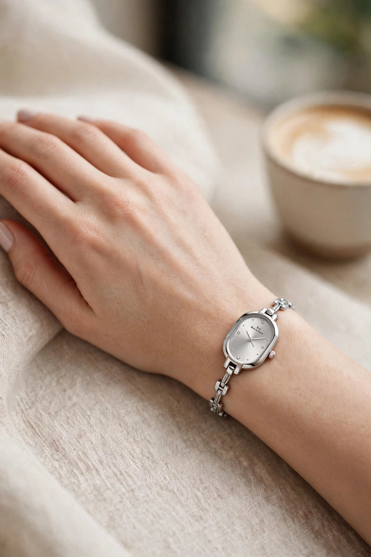 Woman wearing silver watch, everyday styling