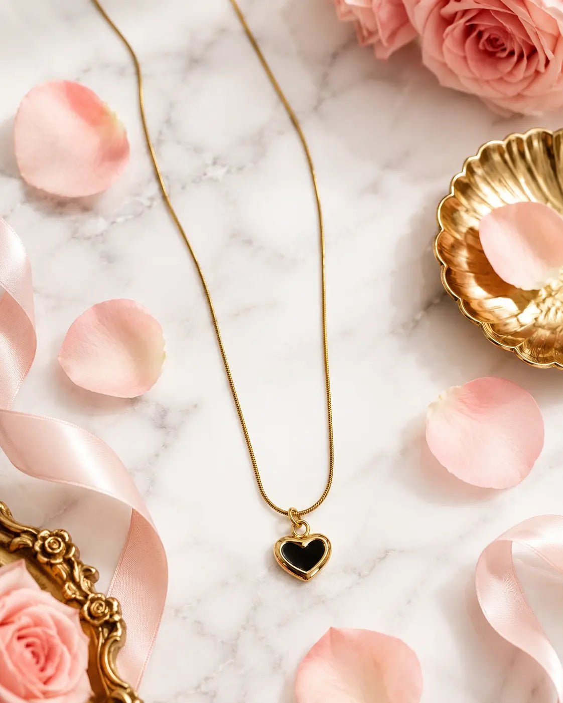Flat lay of Black Heart Necklace - CharmsCrafted