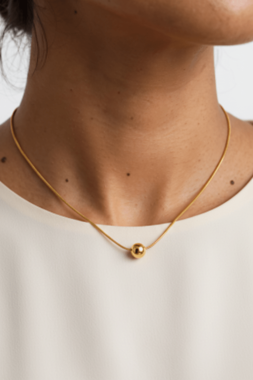Woman wearing Elegant Gold Dainty Ball Necklace - CharmsCrafted