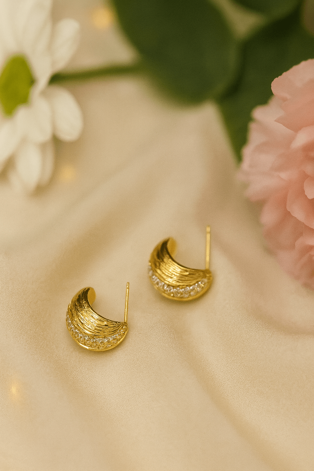 Flat lay of Eternity Gold Plated studs - CharmsCrafted
