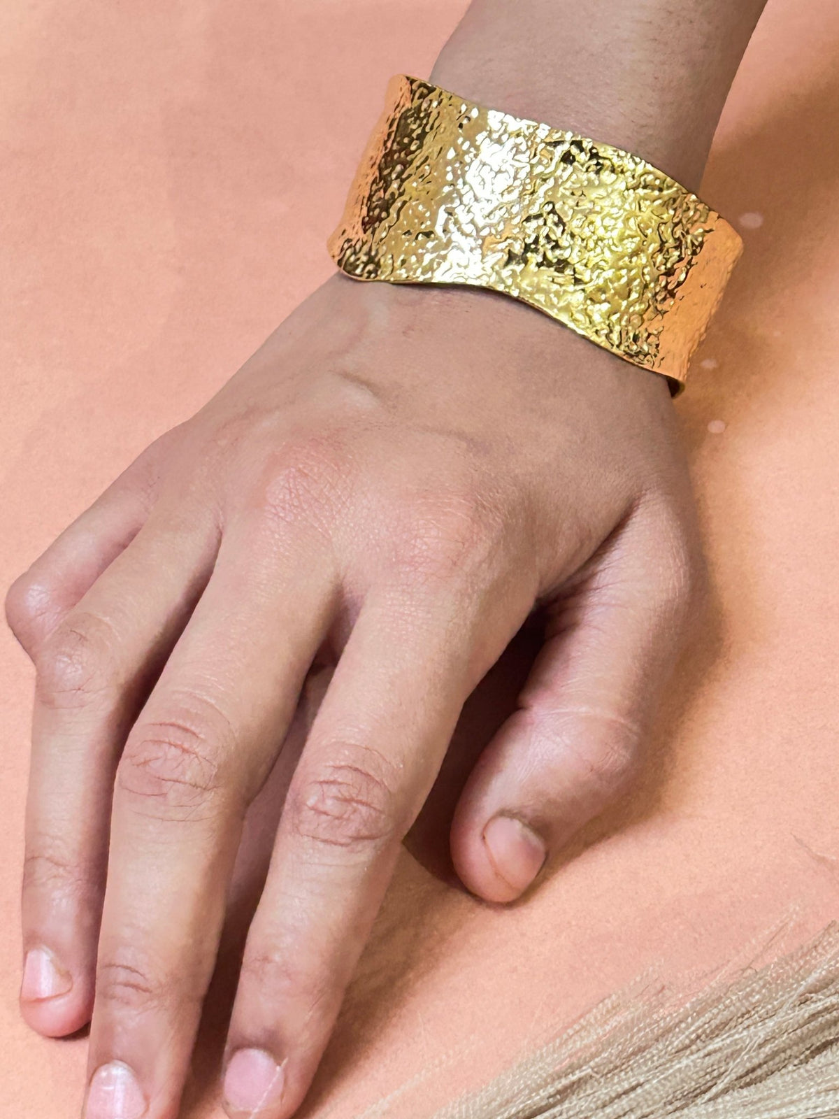 Woman wearing Golden Hammered Cuff Bracelet - CharmsCrafted