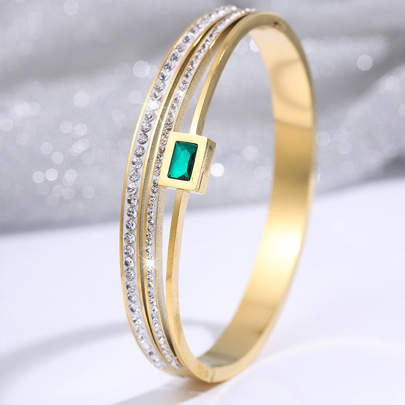 gold diamond kada with green stone